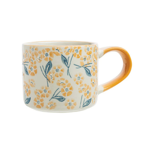Handgefertigte Tranquillo Tasse VINTAGE GARDEN orange aus Steinzeug mit floralen Mustern, ideal für Kaffee oder Tee.