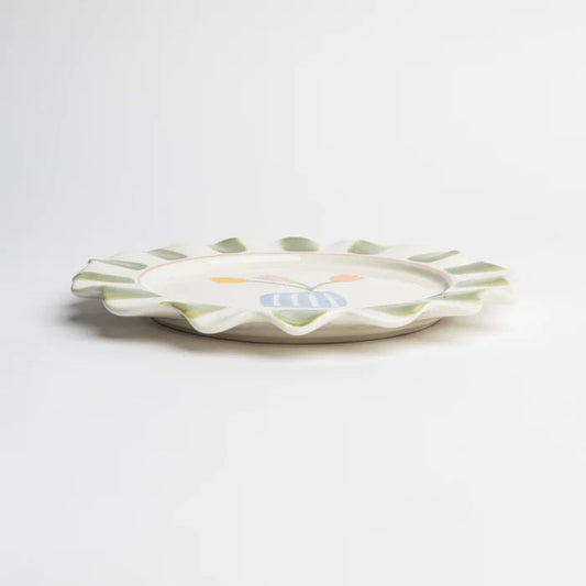 Grüner Steinzeugteller von Tranquillo mit handbemaltem, kinderfreundlichem Design, ideal für den täglichen Gebrauch.
