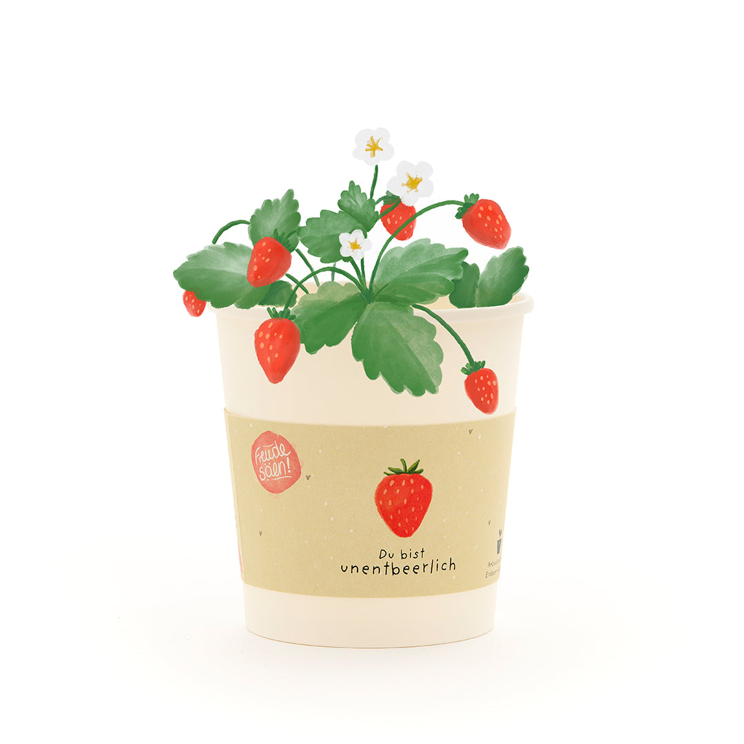 Becher von Die Stadtgärtner mit "Du bist unentbeerlich" Pflanzenbauset-Design, freigestellt auf weißem Hintergrund.