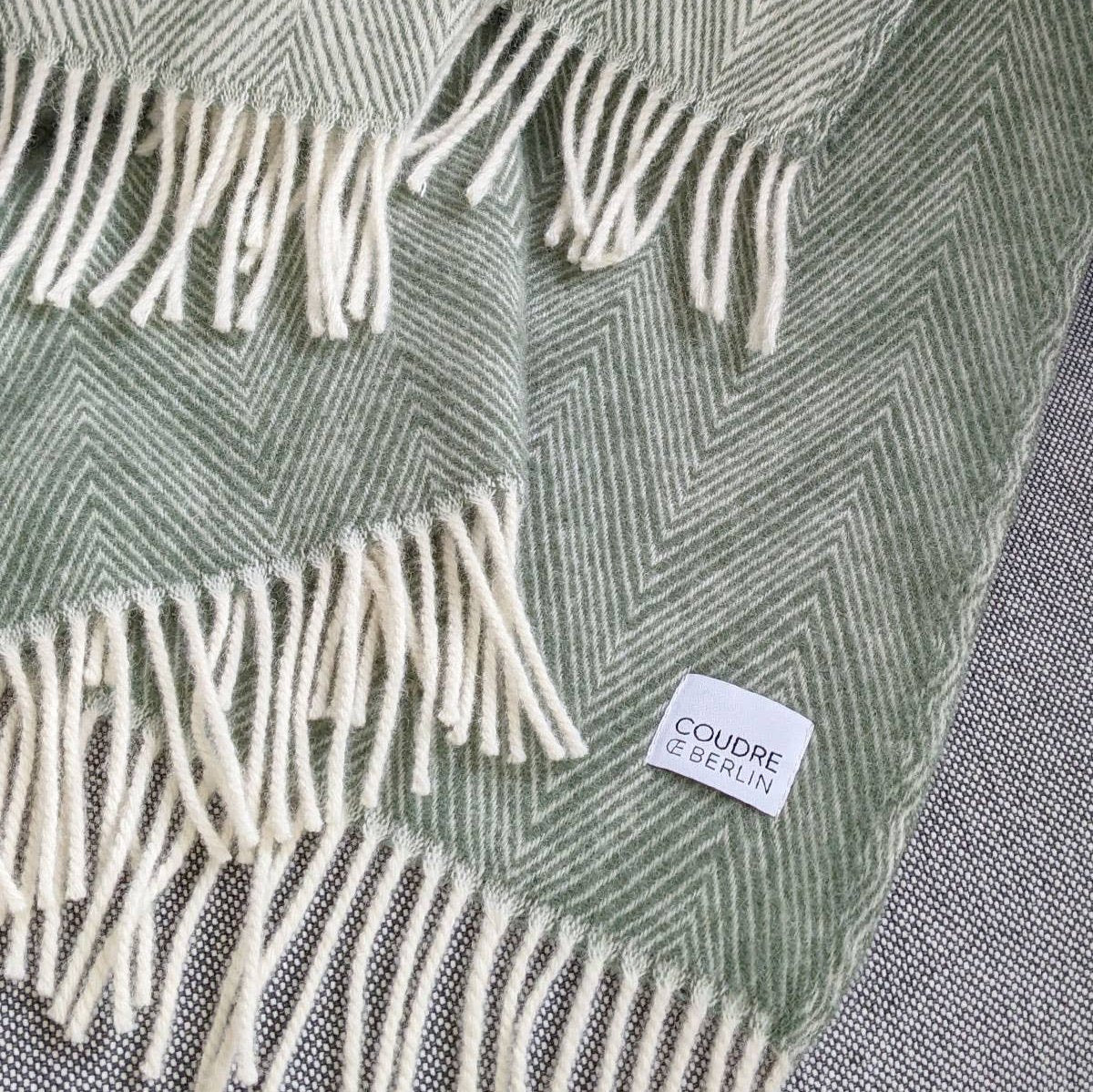 Wool blanket / cuddly blanket in herringbone pattern - Aloe green - new wool