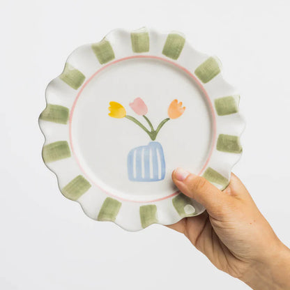 Tranquillo VELOBLOOM grüner Steinzeug-Teller, handbemalt, kinderfreundlich, mit bunten Mustern auf weißem Hintergrund