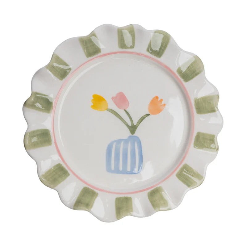 Grüner Steinzeugteller von Tranquillo mit handbemaltem Muster, kinderfreundlich, ideal für den täglichen Gebrauch.